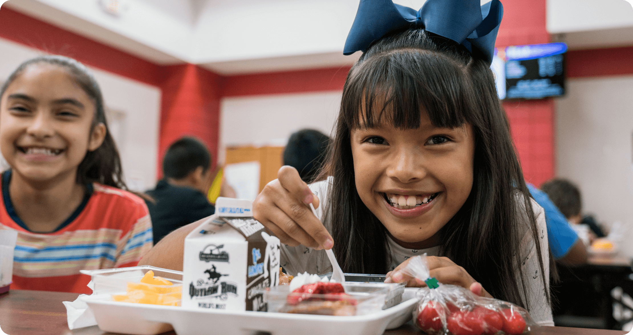 Focus area background image -- girl eating lunch