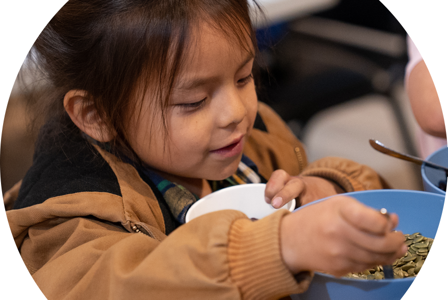 Sicangu – Girl eating school food